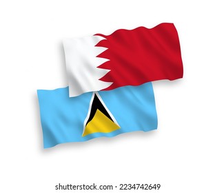 National vector fabric wave flags of Saint Lucia and Bahrain isolated on white background. 1 to 2 proportion.