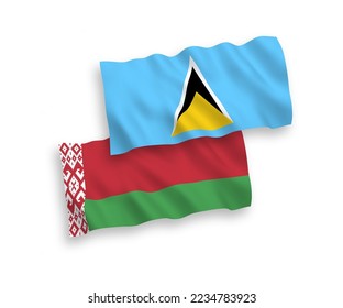 National vector fabric wave flags of Saint Lucia and Belarus isolated on white background. 1 to 2 proportion.