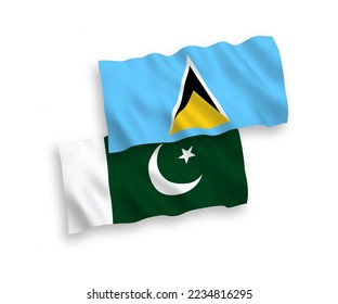 National vector fabric wave flags of Saint Lucia and Pakistan isolated on white background. 1 to 2 proportion.