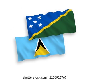 National vector fabric wave flags of Saint Lucia and Solomon Islands isolated on white background. 1 to 2 proportion.