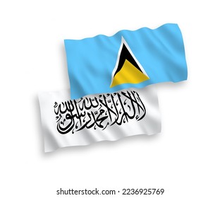 National vector fabric wave flags of Saint Lucia and Islamic Emirate of Afghanistan isolated on white background. 1 to 2 proportion.