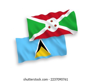 National vector fabric wave flags of Saint Lucia and Burundi isolated on white background. 1 to 2 proportion.