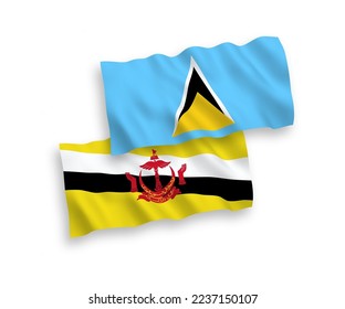 National vector fabric wave flags of Saint Lucia and Brunei isolated on white background. 1 to 2 proportion.