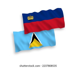National vector fabric wave flags of Saint Lucia and Liechtenstein isolated on white background. 1 to 2 proportion.