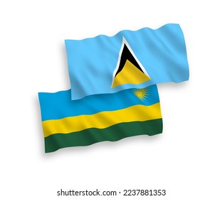 National vector fabric wave flags of Saint Lucia and Republic of Rwanda isolated on white background. 1 to 2 proportion.