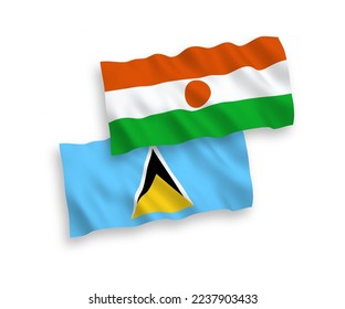 National vector fabric wave flags of Saint Lucia and Republic of the Niger isolated on white background. 1 to 2 proportion.
