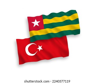 National vector fabric wave flags of Turkey and Togolese Republic isolated on white background. 1 to 2 proportion.