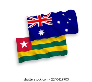 National vector fabric wave flags of Australia and Togolese Republic isolated on white background. 1 to 2 proportion.