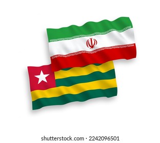 National vector fabric wave flags of Togolese Republic and Iran isolated on white background. 1 to 2 proportion.
