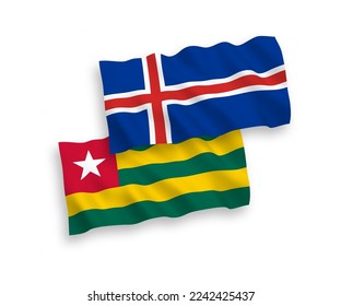 Banderas de olas de tela vectorial nacional de la República Togolesa e Islandia aisladas en fondo blanco. de 1 a 2.