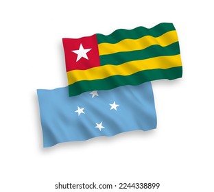 National vector fabric wave flags of Togolese Republic and Federated States of Micronesia isolated on white background. 1 to 2 proportion.