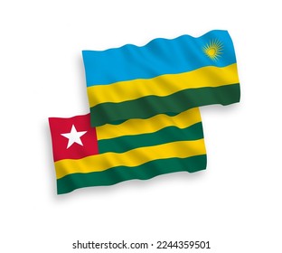 National vector fabric wave flags of Togolese Republic and Republic of Rwanda isolated on white background. 1 to 2 proportion.