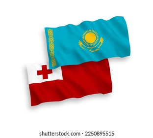 National vector fabric wave flags of Kazakhstan and Kingdom of Tonga isolated on white background. 1 to 2 proportion.