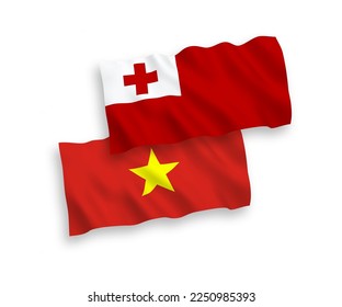 National vector fabric wave flags of Kingdom of Tonga and Vietnam isolated on white background. 1 to 2 proportion.