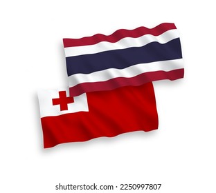 National vector fabric wave flags of Kingdom of Tonga and Thailand isolated on white background. 1 to 2 proportion.