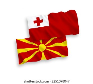 National vector fabric wave flags of Kingdom of Tonga and North Macedonia isolated on white background. 1 to 2 proportion.