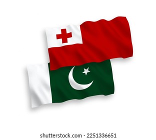 National vector fabric wave flags of Kingdom of Tonga and Pakistan isolated on white background. 1 to 2 proportion.