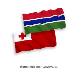 National vector fabric wave flags of Kingdom of Tonga and Republic of Gambia isolated on white background. 1 to 2 proportion.