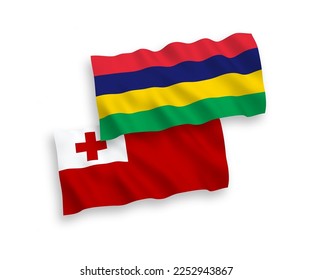 National vector fabric wave flags of Kingdom of Tonga and Republic of Mauritius isolated on white background. 1 to 2 proportion.