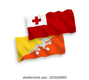 National vector fabric wave flags of Kingdom of Tonga and Kingdom of Bhutan isolated on white background. 1 to 2 proportion.