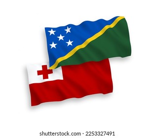 National vector fabric wave flags of Kingdom of Tonga and Solomon Islands isolated on white background. 1 to 2 proportion.