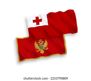 National vector fabric wave flags of Kingdom of Tonga and Montenegro isolated on white background. 1 to 2 proportion.