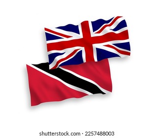 National vector fabric wave flags of Great Britain and Republic of Trinidad and Tobago isolated on white background. 1 to 2 proportion.