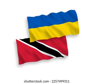 National vector fabric wave flags of Republic of Trinidad and Tobago and Ukraine isolated on white background. 1 to 2 proportion.