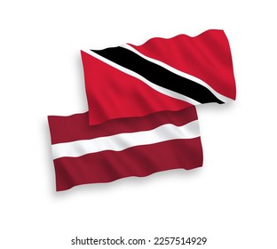 National vector fabric wave flags of Latvia and Republic of Trinidad and Tobago isolated on white background. 1 to 2 proportion.