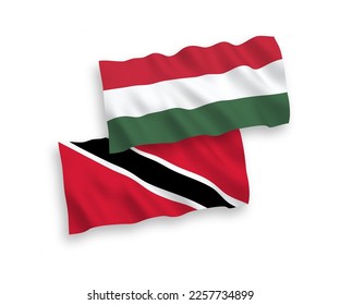 National vector fabric wave flags of Republic of Trinidad and Tobago and Hungary isolated on white background. 1 to 2 proportion.