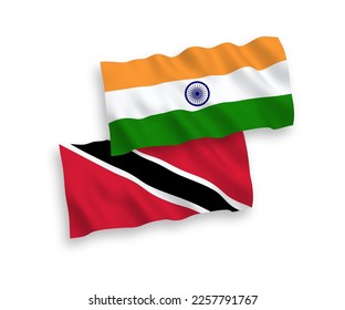 National vector fabric wave flags of India and Republic of Trinidad and Tobago isolated on white background. 1 to 2 proportion.