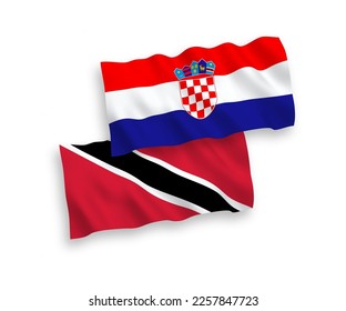 Banderas de olas de tela vectorial nacional de la República de Trinidad y Tabago y Croacia aisladas en fondo blanco. de 1 a 2.