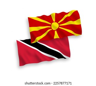 National vector fabric wave flags of Republic of Trinidad and Tobago and North Macedonia isolated on white background. 1 to 2 proportion.