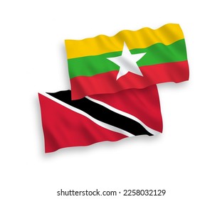 Banderas de olas de tela vectorial nacional de la República de Trinidad y Tabago y Myanmar aisladas de fondo blanco. de 1 a 2.