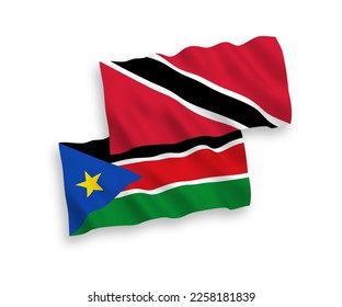 National vector fabric wave flags of Republic of Trinidad and Tobago and Republic of South Sudan isolated on white background. 1 to 2 proportion.