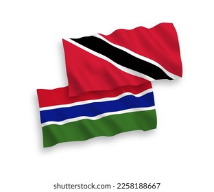 National vector fabric wave flags of Republic of Trinidad and Tobago and Republic of Gambia isolated on white background. 1 to 2 proportion.