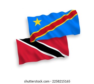 Banderas de ondulación de tela vectorial nacional de la República de Trinidad y Tabago y la República Democrática del Congo aisladas de fondo blanco. de 1 a 2.