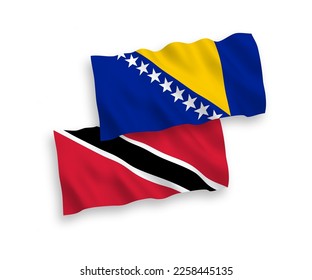 National vector fabric wave flags of Republic of Trinidad and Tobago and Bosnia and Herzegovina isolated on white background. 1 to 2 proportion.