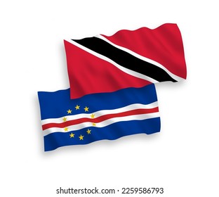 National vector fabric wave flags of Republic of Trinidad and Tobago and Republic of Cabo Verde isolated on white background. 1 to 2 proportion.