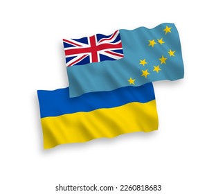 National vector fabric wave flags of Tuvalu and Ukraine isolated on white background. 1 to 2 proportion.