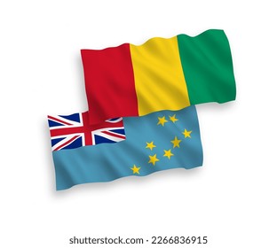 National vector fabric wave flags of Tuvalu and Guinea isolated on white background. 1 to 2 proportion.