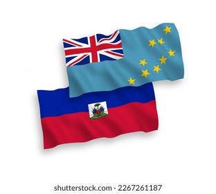 National vector fabric wave flags of Tuvalu and Republic of Haiti isolated on white background. 1 to 2 proportion.