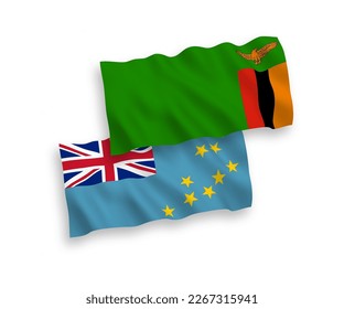 Banderas de olas de tela vectorial nacional de Tuvalu y la República de Zambia aisladas en fondo blanco. de 1 a 2.
