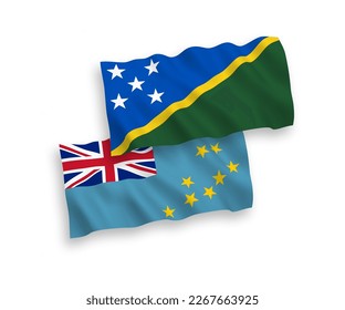 National vector fabric wave flags of Tuvalu and Solomon Islands isolated on white background. 1 to 2 proportion.
