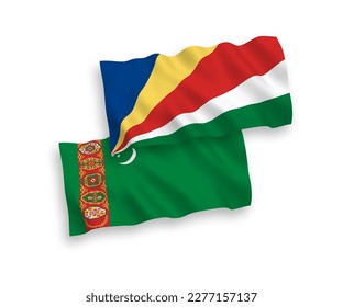 National vector fabric wave flags of Turkmenistan and Seychelles isolated on white background. 1 to 2 proportion.