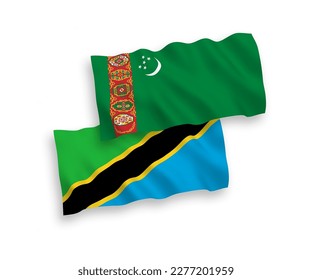 National vector fabric wave flags of Turkmenistan and Tanzania isolated on white background. 1 to 2 proportion.