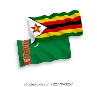 National vector fabric wave flags of Turkmenistan and Zimbabwe isolated on white background. 1 to 2 proportion.