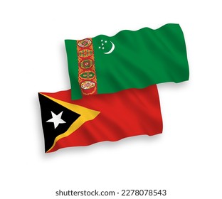 Banderas de olas de tela vectorial nacional de Turkmenistán y Timor Oriental aisladas en fondo blanco. de 1 a 2.