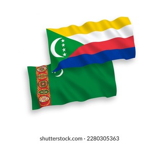 Nationale Vektor-Wellen-Flaggen Turkmenistans und Union der Komoren einzeln auf weißem Hintergrund. 1 bis 2 %.