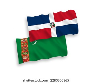National vector fabric wave flags of Turkmenistan and Dominican Republic isolated on white background. 1 to 2 proportion.